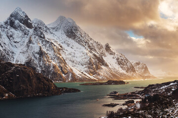 Obraz premium Snow-Capped Mountains and Calm Sea