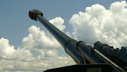 howitzer and clouds