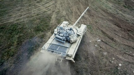 drone view - heavy tank at full speed off-road