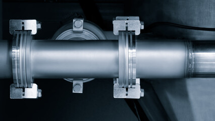 A pipe with a silver cap on it. The cap is attached to a pipe with a silver band