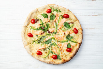 Italian pizza with avocado salmon  tomatoes and mozzarella photography. top view