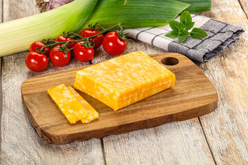 Marble yellow cheese with slices