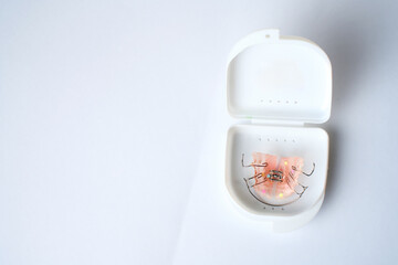 Dental braces, orthodontic bite treatment. Dental Plate for Children, Retainer for teeth correction. Tooth plates