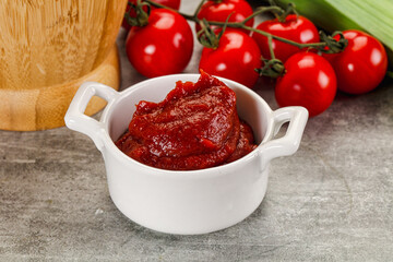 Red tomato paste in the bowl