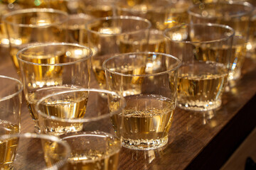 many champagne plastic glasses for celebration party