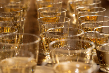 many champagne plastic glasses for celebration party