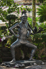 Fototapeta premium Statue in the temple garden at Bangkok, Thailand 