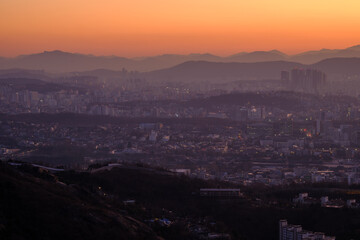 Scenic view of Seoul against sky during sunrise