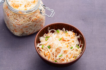 Tasty marinated cabbage with carrot, healthy food  Sauerkraut photography . Top view