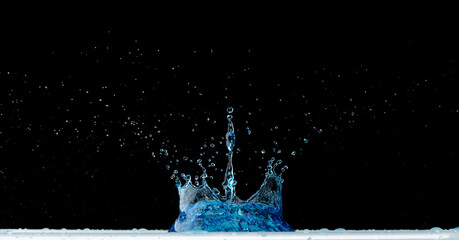 Crown Water splash on object to create shape form fluttering in droplet and wave. Crown water to...