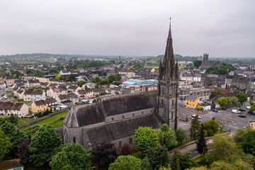 Fototapeta premium Wide aerial photography of Saint Michael's Church in Ballinasloe, Galway, Misty day