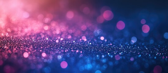 Glittering bokeh background with dark blue pink and purple tones suitable for overlaying text or creating a dreamy atmosphere