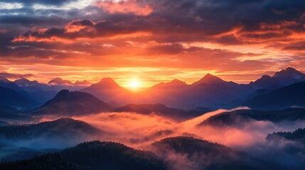 Stunning Sunrise Illuminating Majestic Mountains with Foggy Valleys and Colorful Sky
