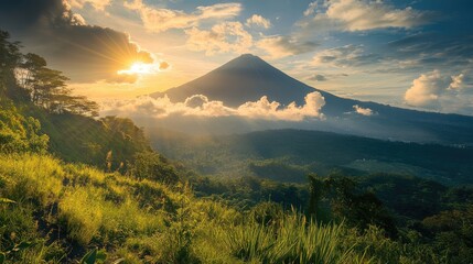 Breathtaking mountain scenery at sunrise with vibrant clouds and lush greenery enhancing the natural beauty of the landscape.