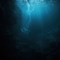 Obraz premium underwater scene, deep blue ocean, sunbeams penetrating water, ethereal light rays, submerged cave, bubbles rising, particles floating, mysterious atmosphere, dark depths, aquatic environment, serene 