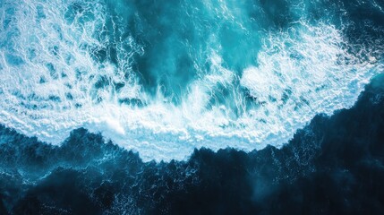 Aerial view of dynamic ocean waves creating a serene and vibrant coastal scene ideal for text overlay and design projects