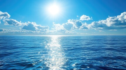 Obraz premium Vibrant seascape with glimmering water under a bright sun and scattered fluffy clouds in a clear blue sky