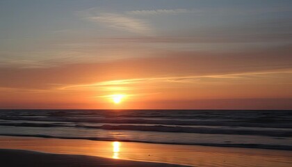 Fototapeta premium Golden sunset over ocean beach