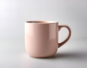 Obraz premium A sleek and modern beige ceramic coffee mug displayed on a neutral-colored surface, perfect for showcasing simplicity and elegance in drinkware design.