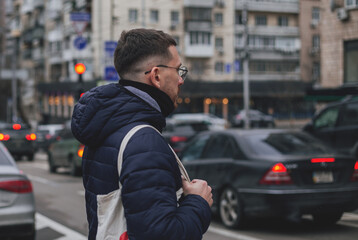 A man walks around the city