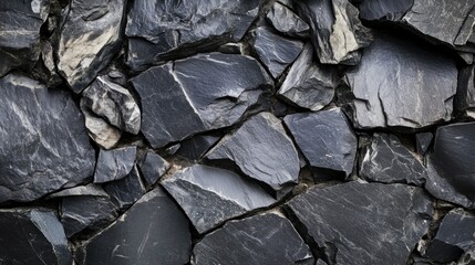 Dimensional black and white stone background with close-up mountain-like textures, offering a bold and rough aesthetic for design projects