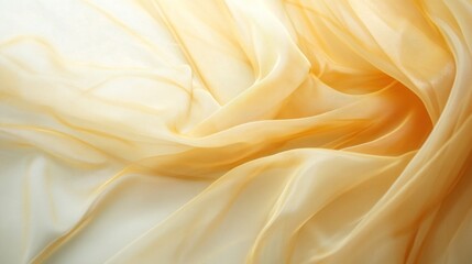 Fototapeta premium Golden satin fabric with a sheer yellow veil overlay, offering a romantic and luxurious template for bridal, Valentine, or award web banners
