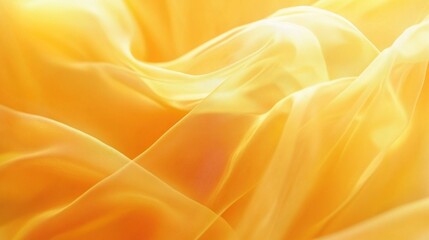 Obraz premium Golden yellow silk satin background with smooth folds and a sheer veil, offering a luxurious template for bridal or Valentine-themed banners