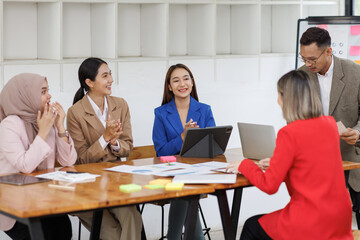Business asian people, happy and celebration for success in office with company investment and stock market bonus. Teamwork, employees and support or trading achievement excited in boardroom.