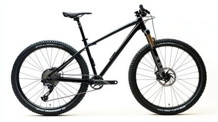 Sleek Black Hardtail Mountain Bike with Gold Fork and Aggressive Tread Tires Isolated on White Background