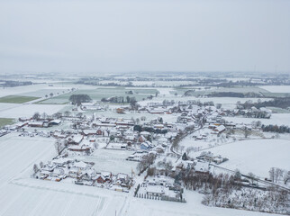 Obraz premium Berenbrock Kreis Soest city Airplane view while snowing in deep winter. snow landscape in 59597