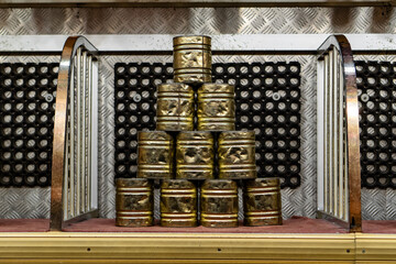 10 empty Cans are stacked for knockdown game at a beer funfair festival. traditional carnival munich oktoberfest game.