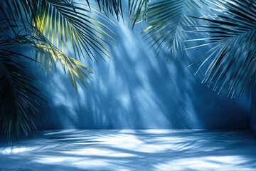 Palm Leaves Cast Shadows on Blue Wall Background, Creating a Serene and Tranquil Atmosphere for Design Projects