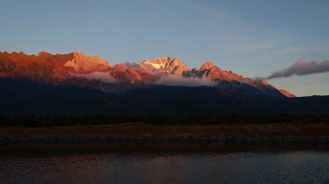 Time-lapse aerial photo of Rizhao Jinshan, Yulong Snow Mountain, Lijiang, Yunnan Province