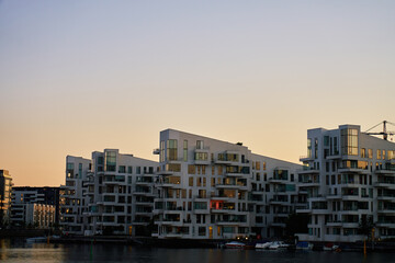 Modern residential buildings along waterfront in Copenhagen, Denmark. Contemporary Scandinavian...
