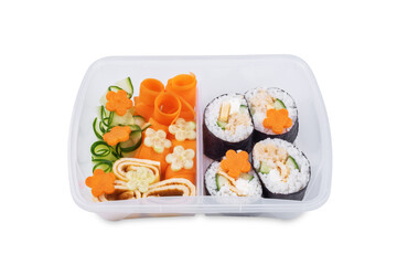 Bento box with sushi set with chicken filling and vegetables on a white isolated background