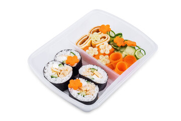 Bento box with sushi set with chicken filling and vegetables on a white isolated background