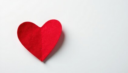 Obraz premium Single red felt heart isolated on white Flat lay perspective , romantic, element