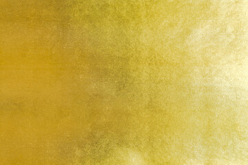 Gold background foil leaf metallic golden texture  gradient light shiny wrapping paper bright yellow solid color wallpaper for design decoration element