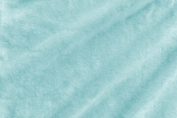 Teal blue velvet background or turquoise suede velour flannel cloth texture made of cotton or wool...