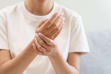 Close-up shot of human hands suffering from ligament inflammation on the palm.