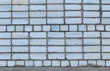 the wall of a modern building made of white silicate brick. texture for the background