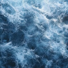Fototapeta premium Powerful ocean waves crash and swirl in deep blue water