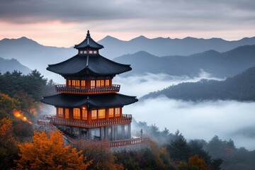 Obraz premium A serene scene of a Buddhist temple in Korea, with intricate architecture and mountains covered in mist in the background