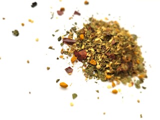 Raw pieces of dried spices on a white background.