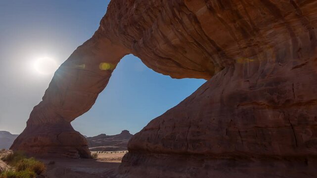 Time lapse of Sunset motion in rainbow arch, with beautiful rock in Al ula, Madinah, Saudi Arabia