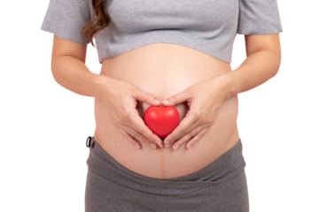 Pregnant woman holding red heart on her belly, symbolizing love and care