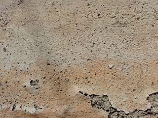 Blur image of Cracked concrete wall covered with gray cement surface as background, abstract, grunge