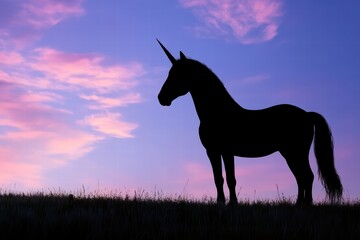 Naklejka premium Majestic Unicorn Silhouette Against Colorful Twilight Sky