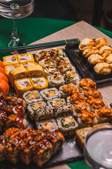A set of sushi and rolls on the festive table