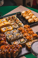 A set of sushi and rolls on the festive table
